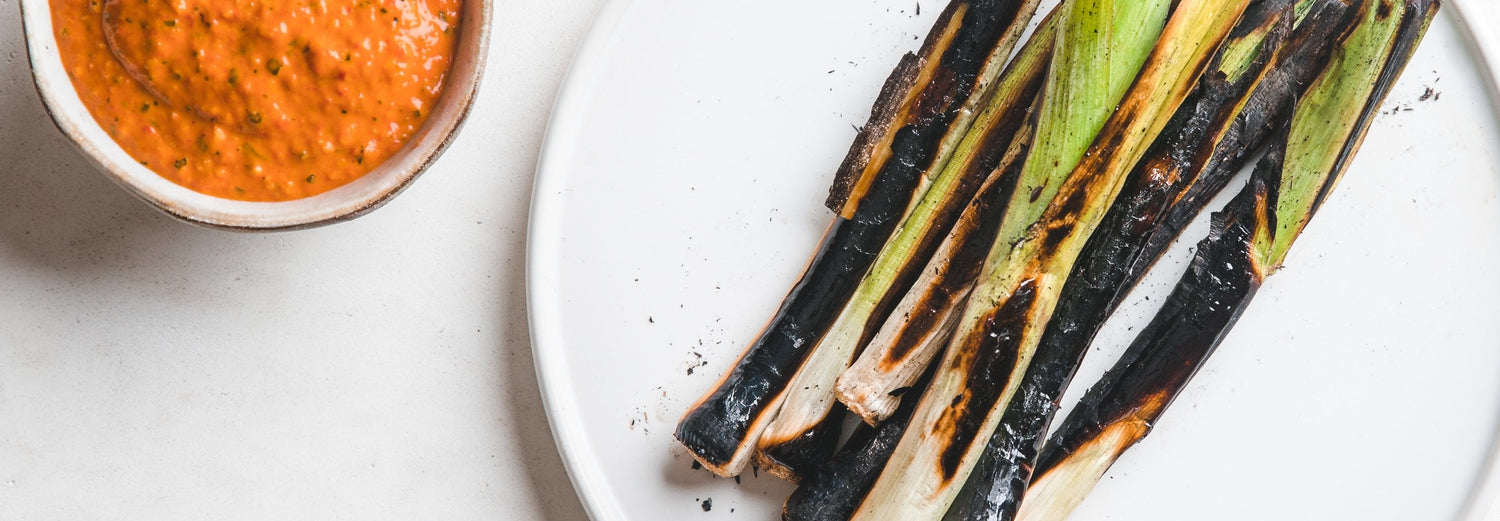 Charred Baby Leeks with Romesco Sauce
