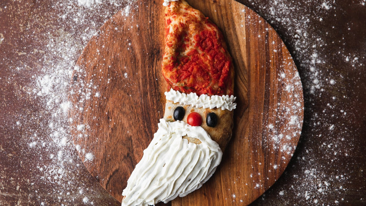 Christmas Calzone with red hat and white beard