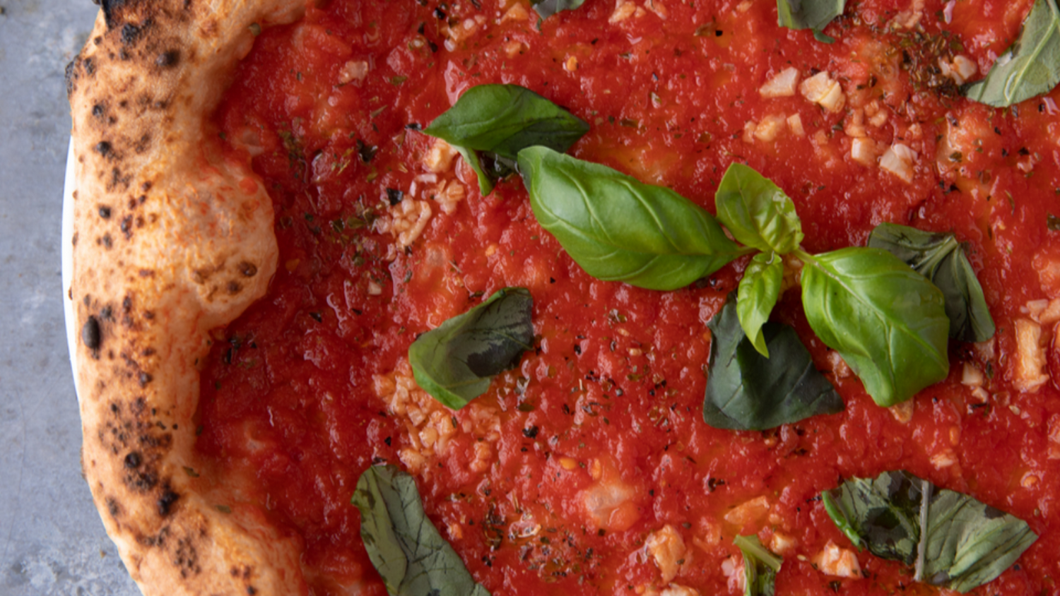Marinara Pizza topped with basil