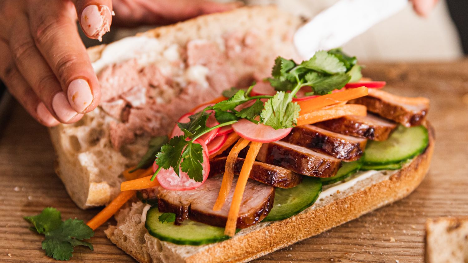 Banh Mi Philly being put together and presented recipe poster image