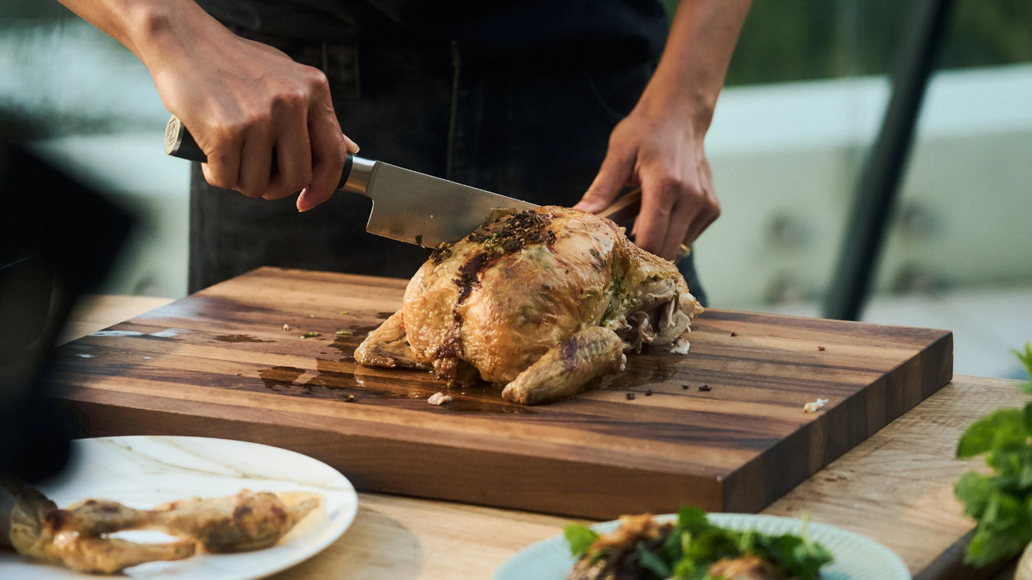 Roasted Chicken being cut into